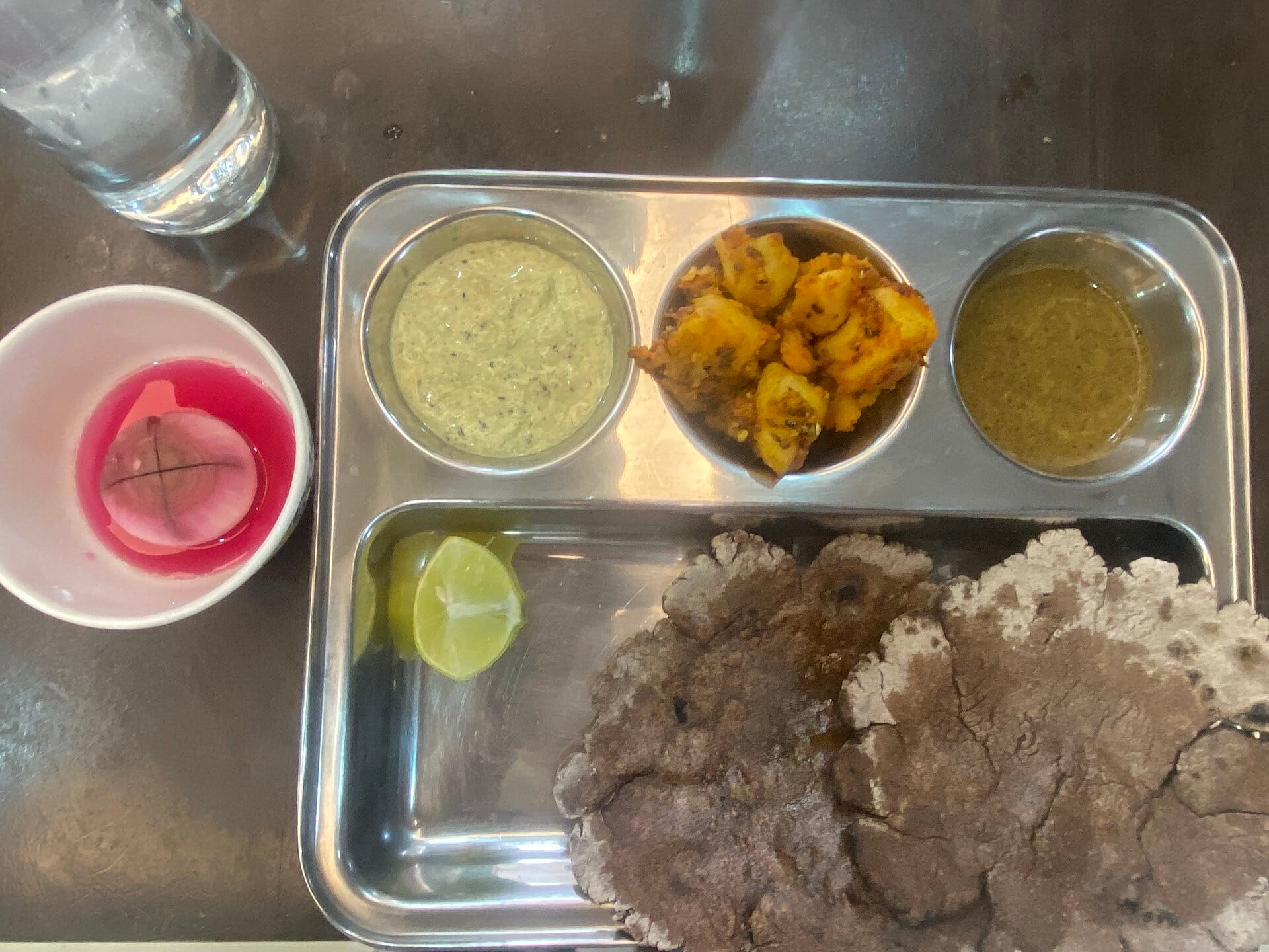 A Kumaoni meal served on a steel plate